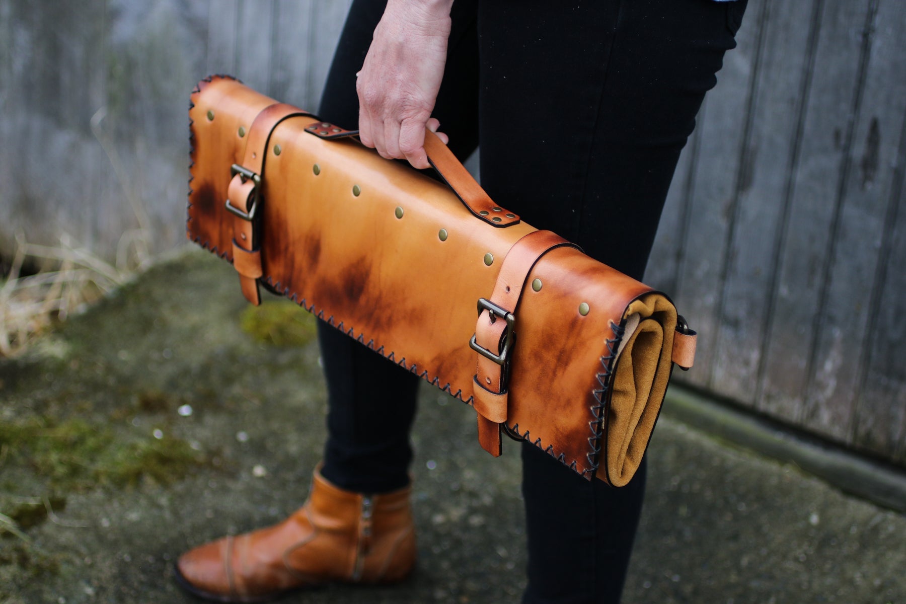 torched leather. knife roll