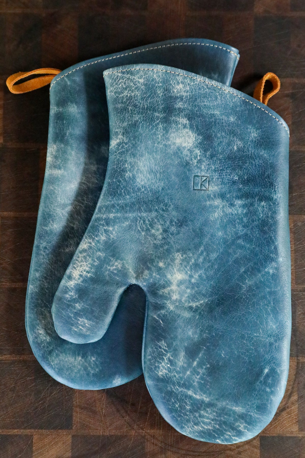 blue leather oven mitt