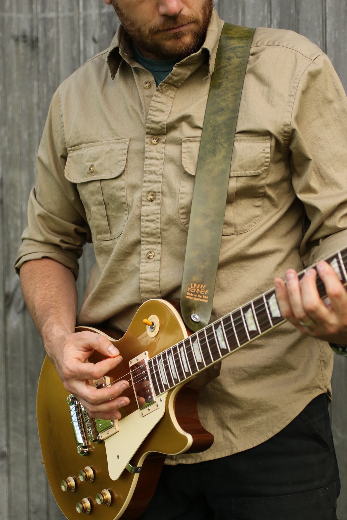 vintage green leather guitar strap