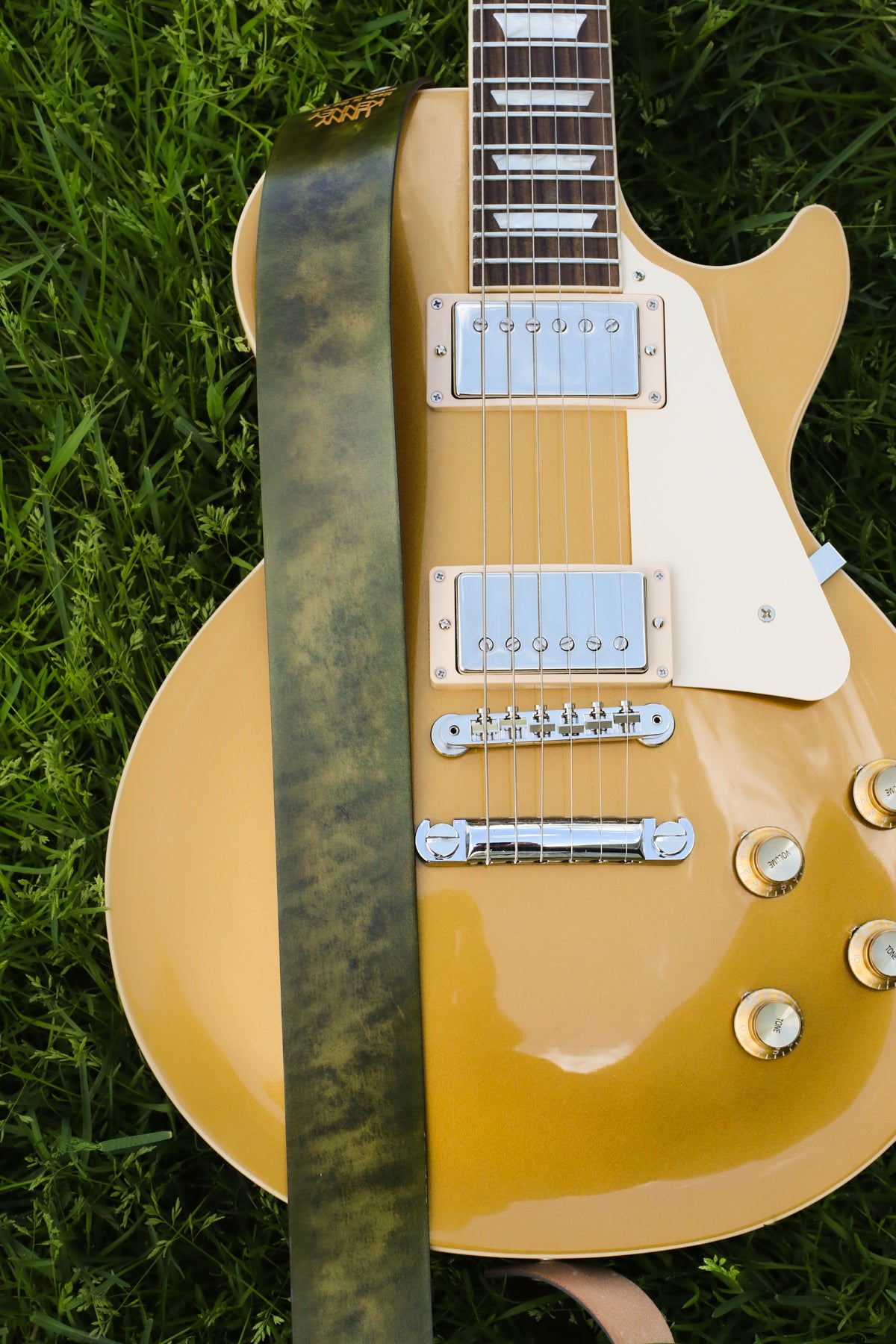 vintage green leather guitar strap