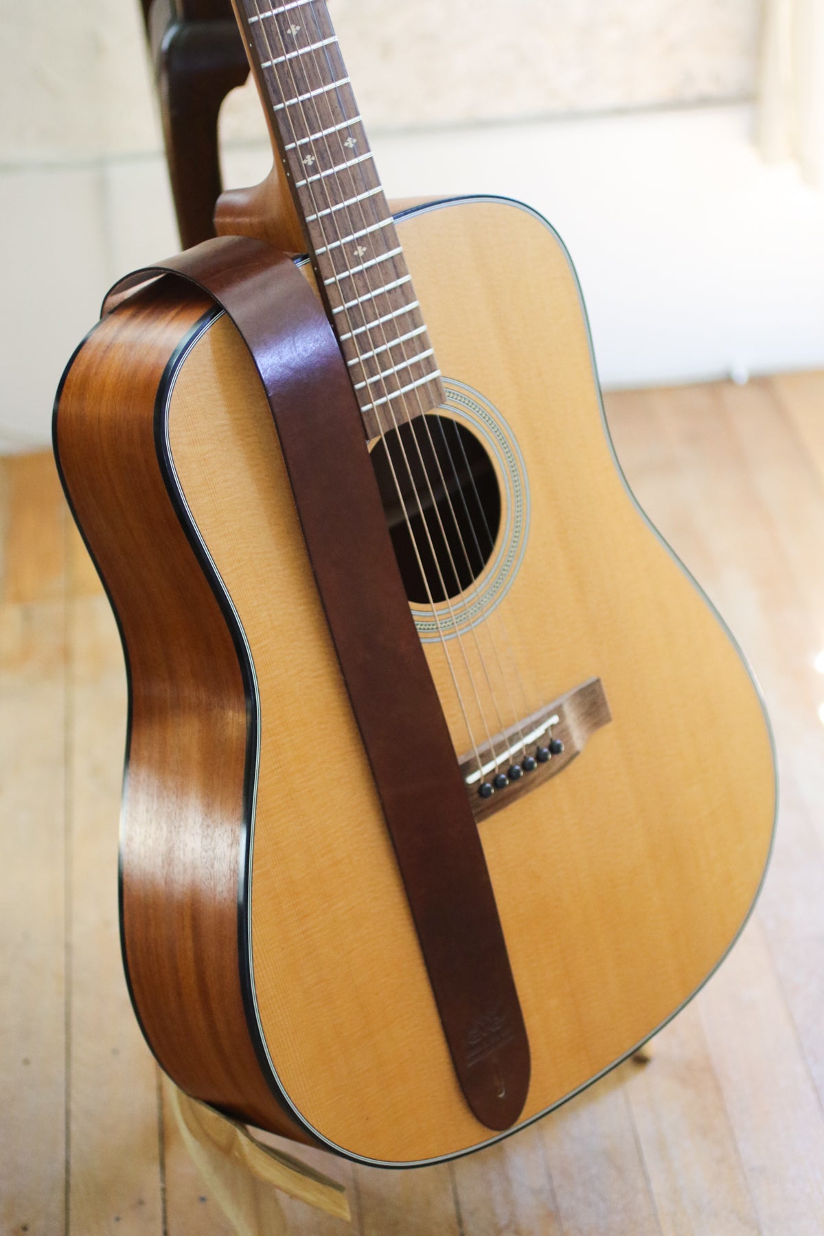 dark brown leather guitar strap