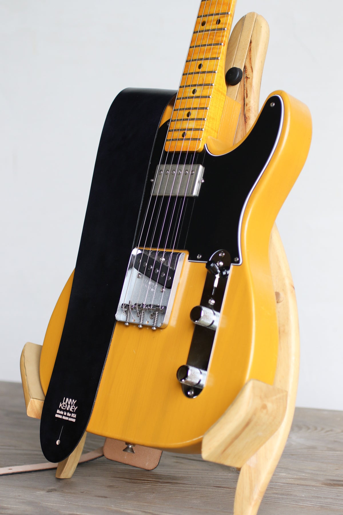 black leather wide guitar strap