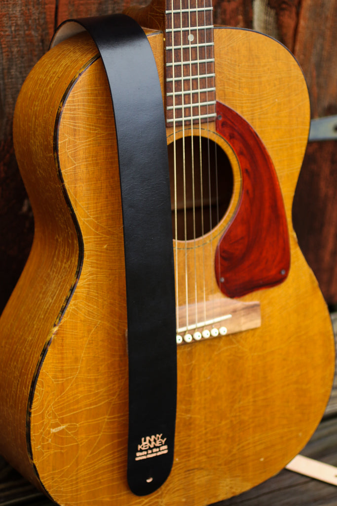 Black leather guitar strap