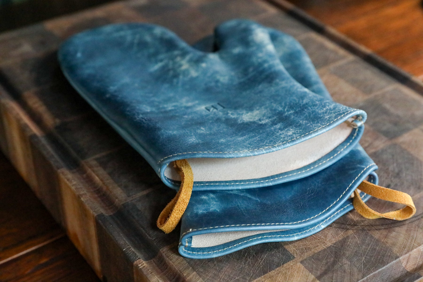 blue leather oven mitt