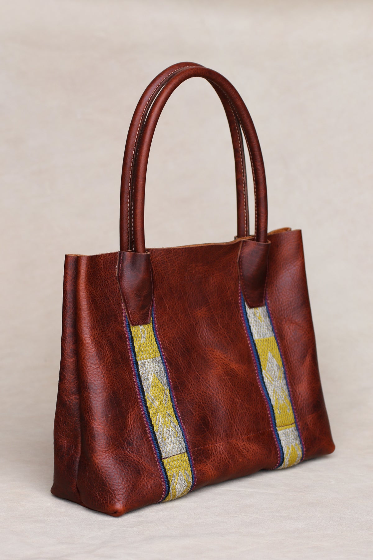 Peruvian textile bison leather tote