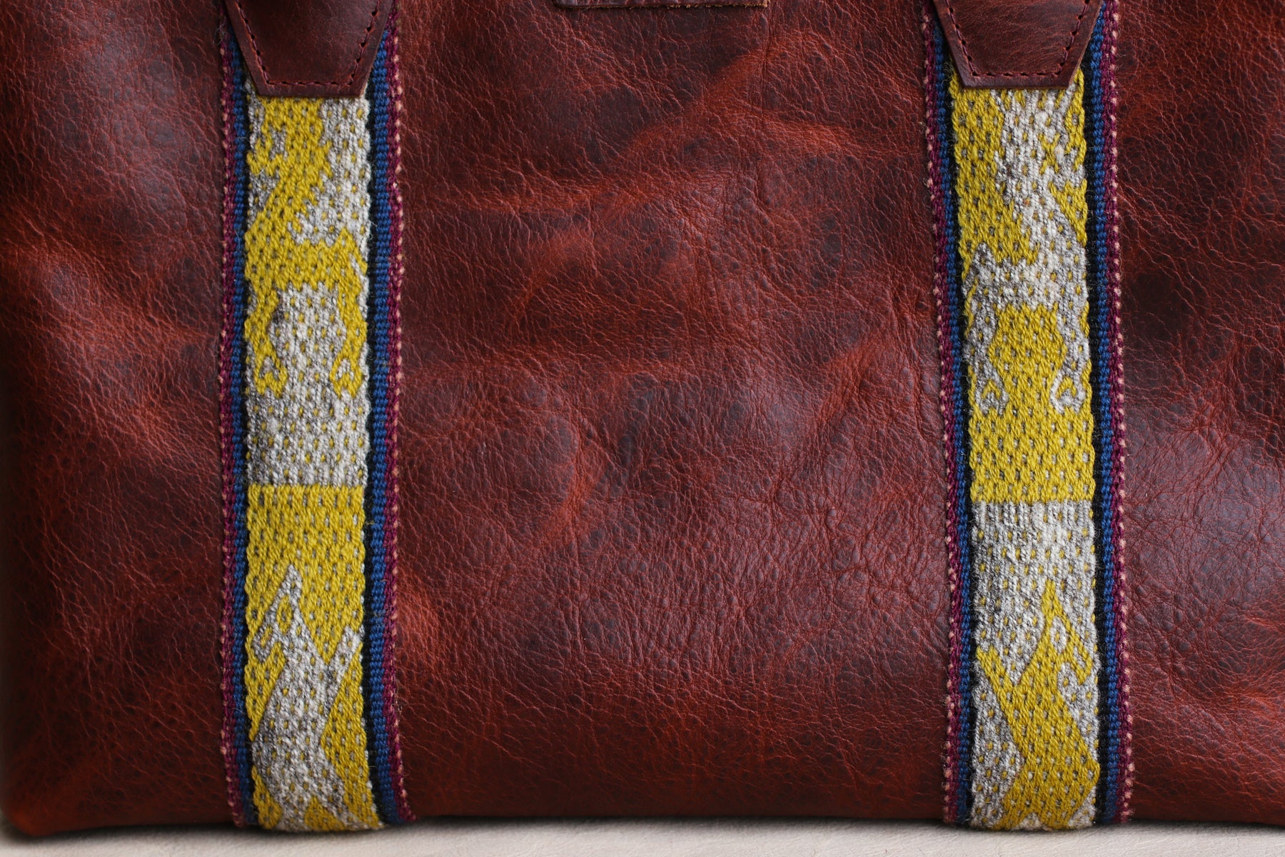 Peruvian textile bison leather tote