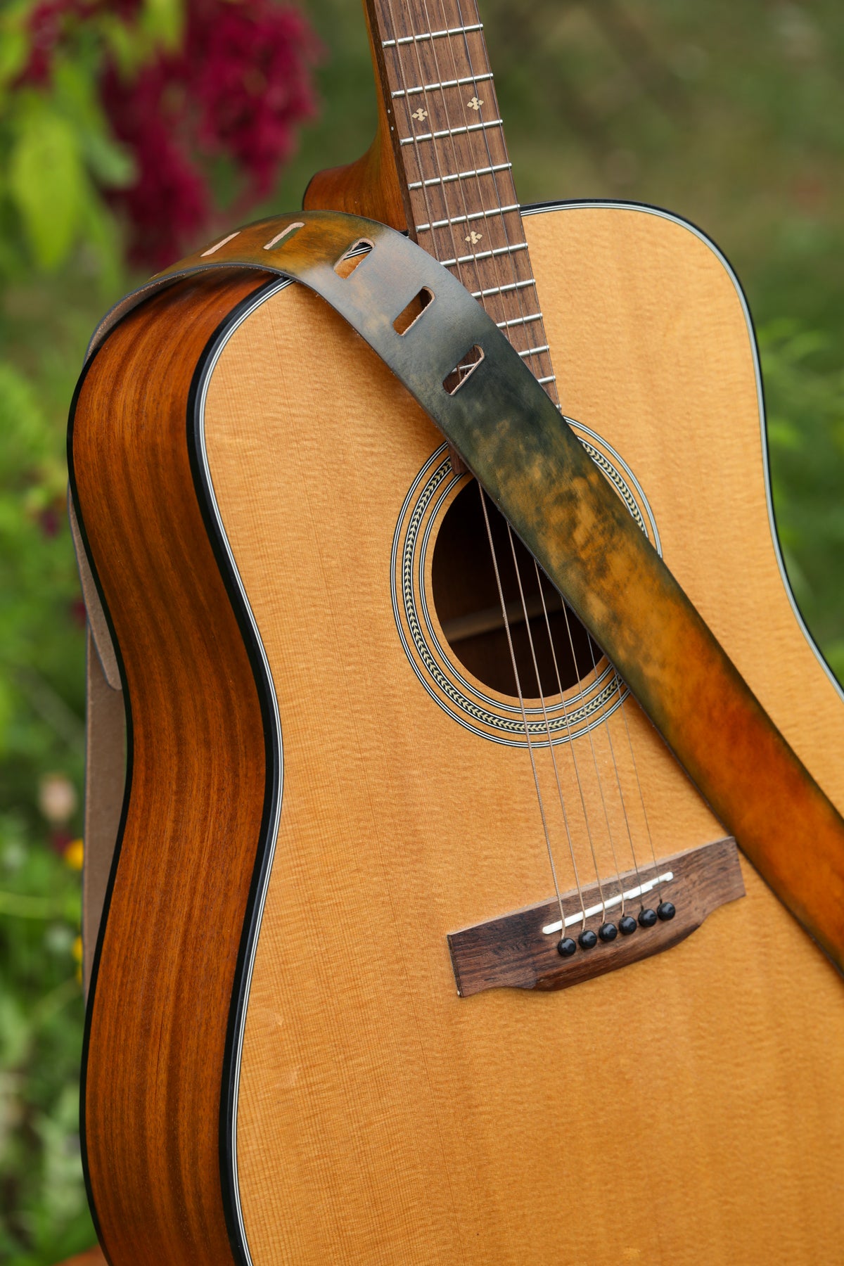 stained Italian leather guitar strap by Linny Kenney