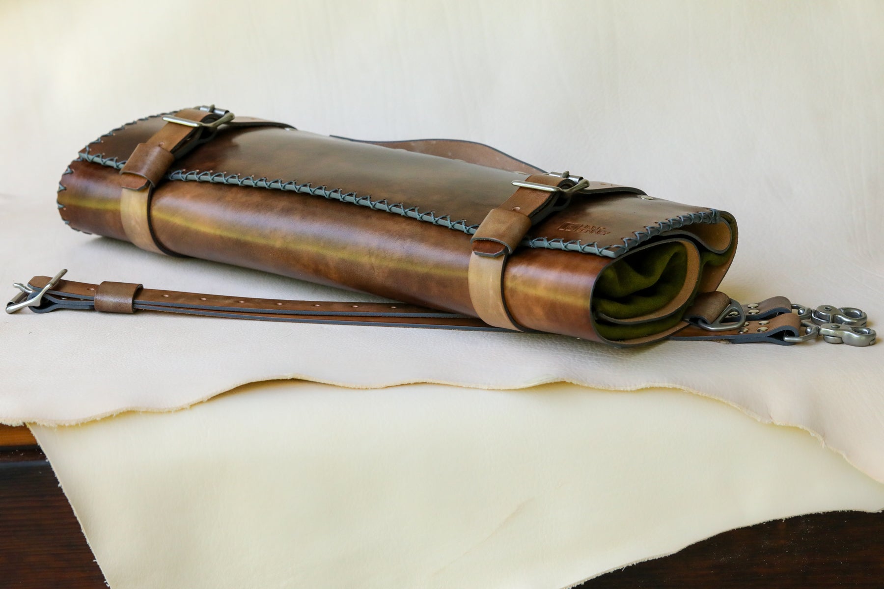 Italian leather knife roll with olive green interior