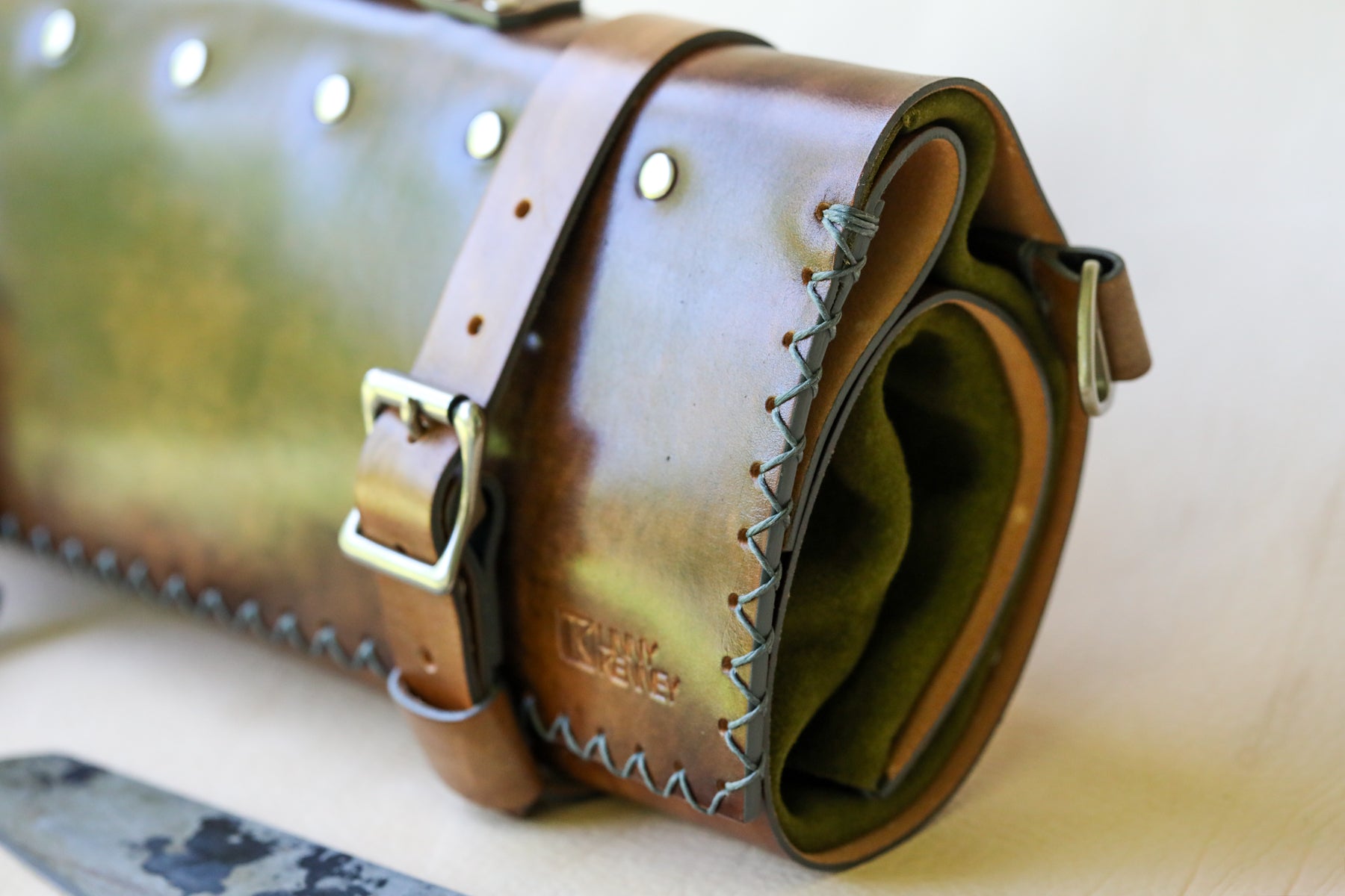 Italian leather knife roll with olive green interior