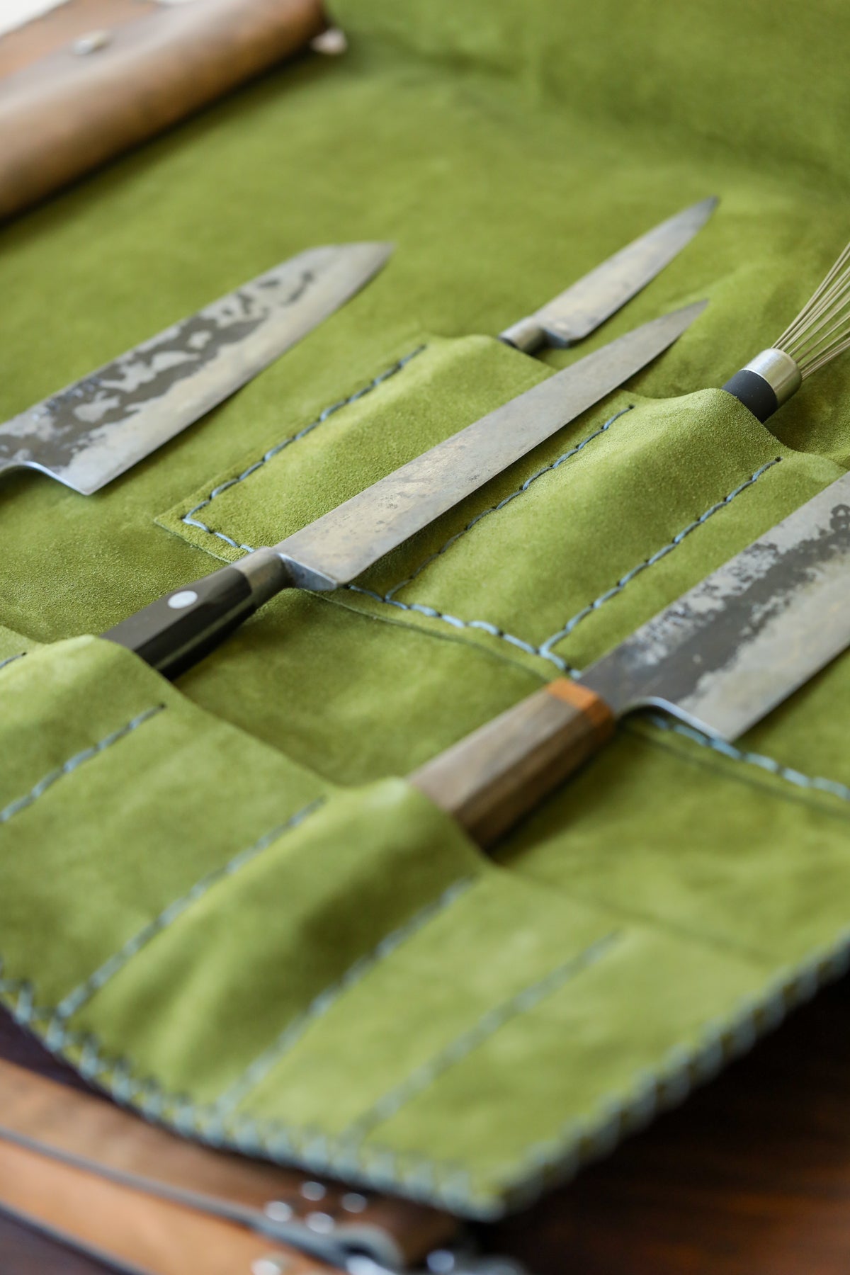Italian leather knife roll with olive green interior