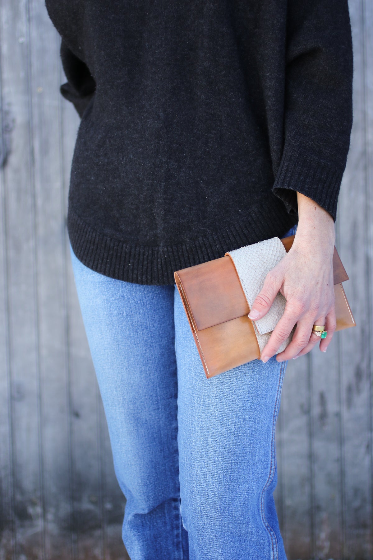 salmon and leather clutch