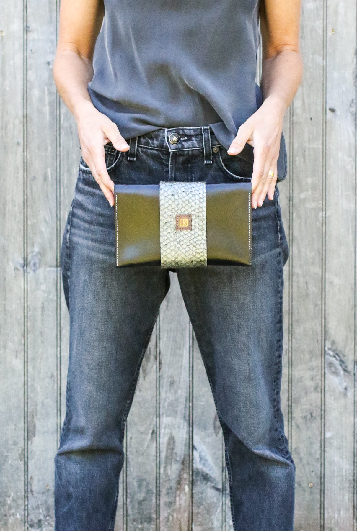 black leather perch clutch